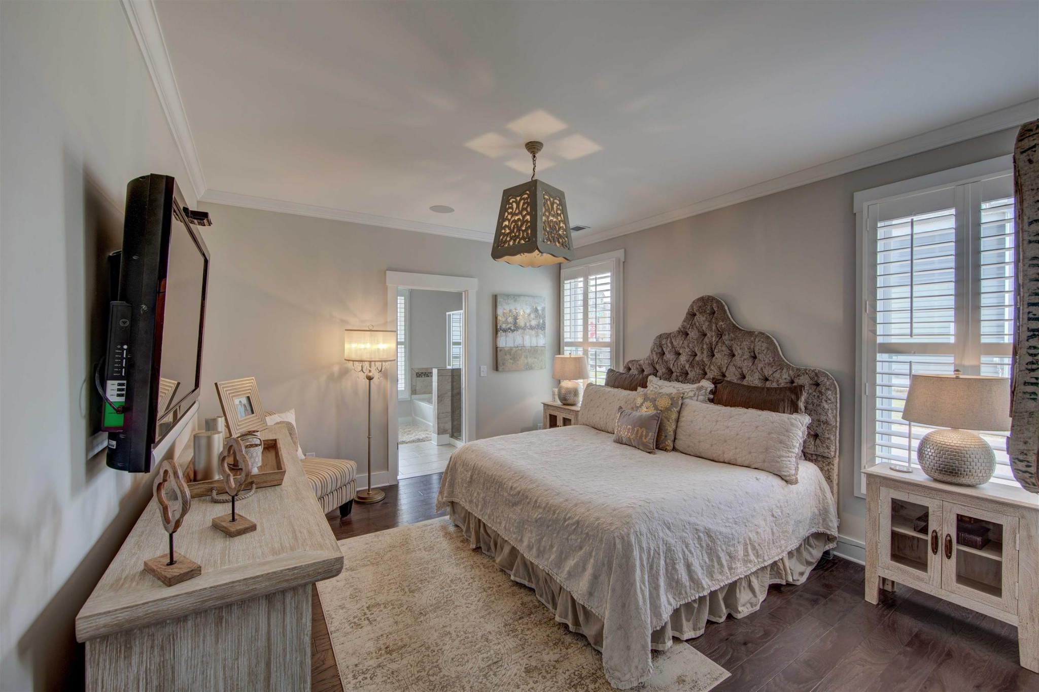 4343 Maxwell Road Antioch, TN 37013 - Photo 16 of 31 a bedroom with a bed and a chandelier