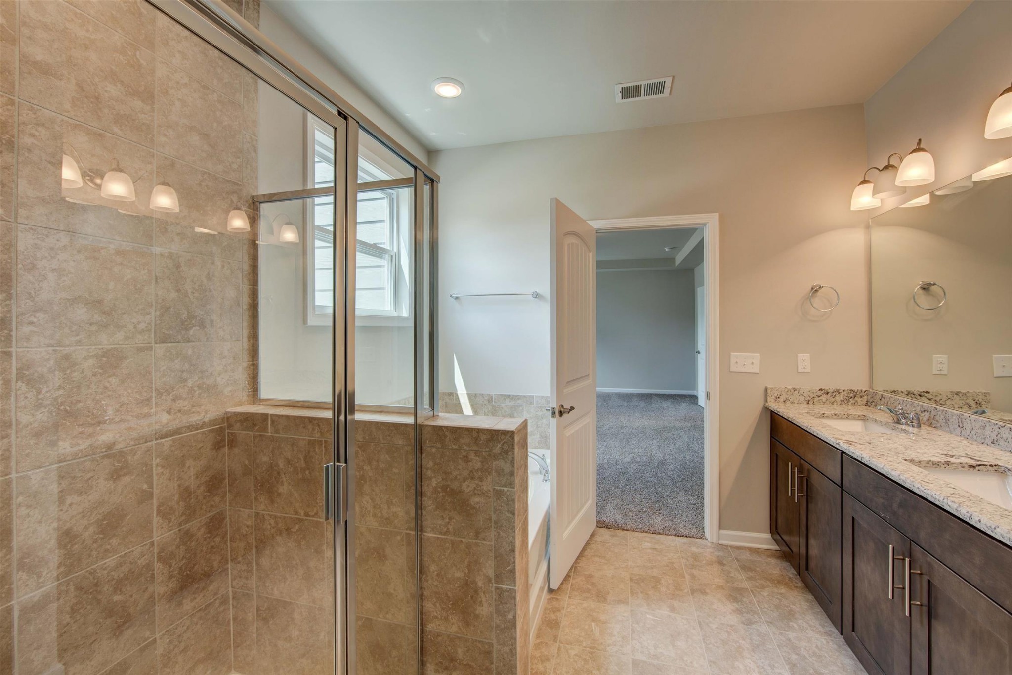 4343 Maxwell Road Antioch, TN 37013 - Photo 19 of 31 a bathroom with a granite countertop sink and a mirror