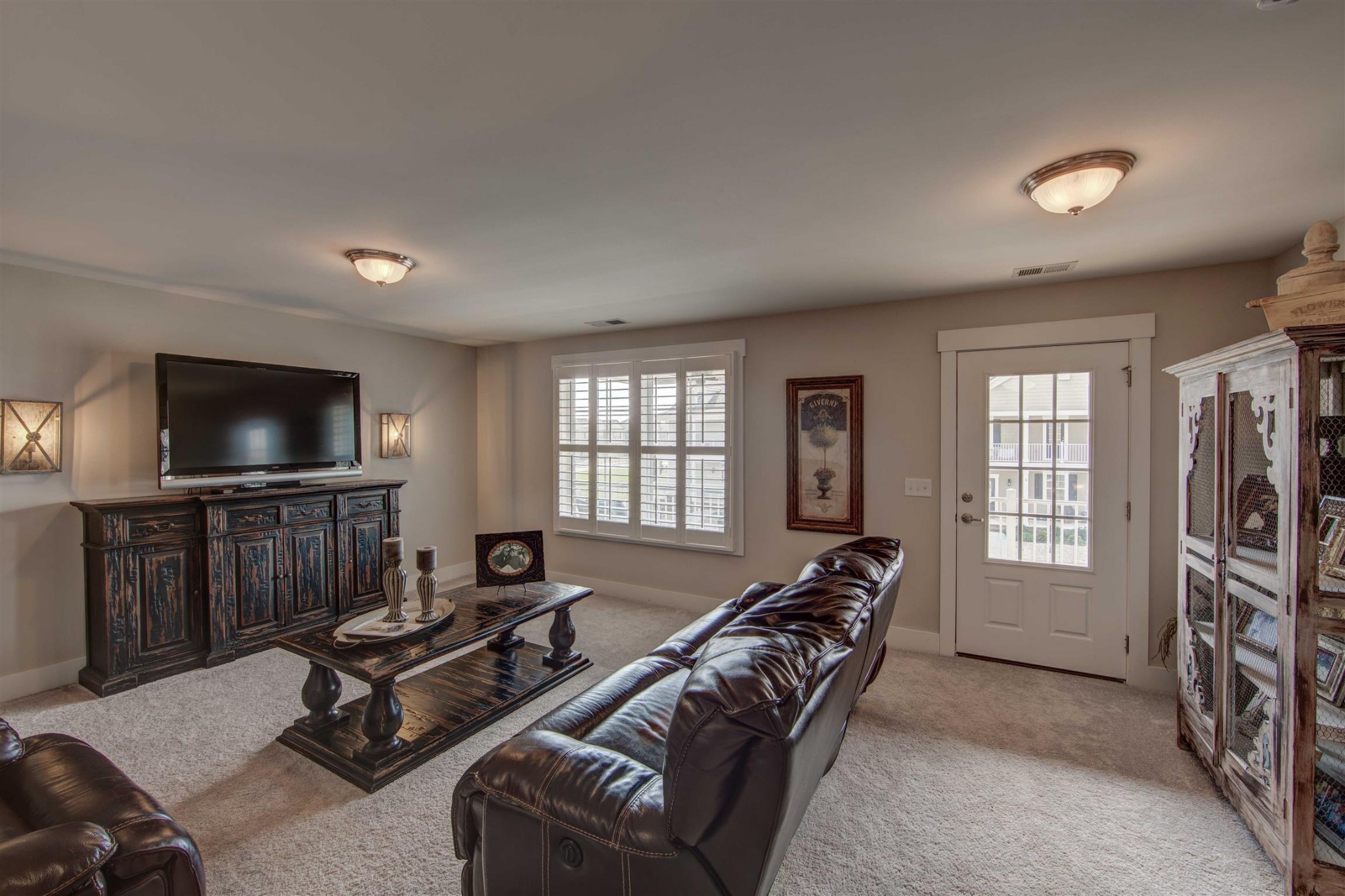 4343 Maxwell Road Antioch, TN 37013 - Photo 21 of 31 a living room with furniture a flat screen tv and a window