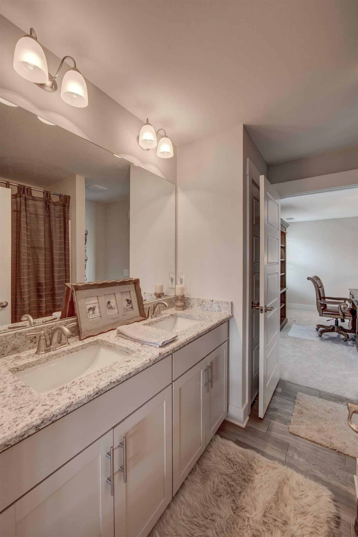 4343 Maxwell Road Antioch, TN 37013 - Photo 26 of 31 a bathroom with a granite countertop sink double and mirror