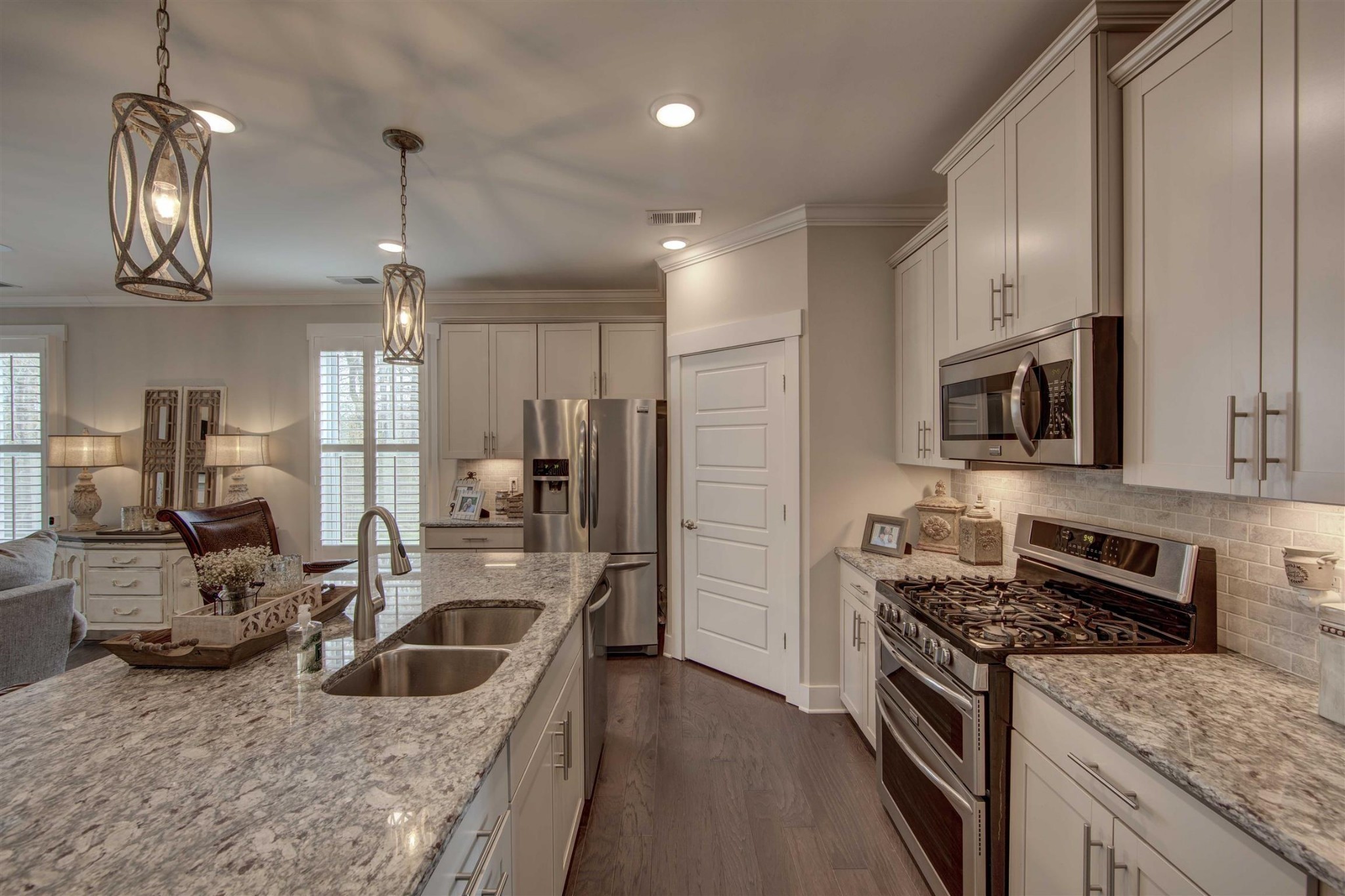 4343 Maxwell Road Antioch, TN 37013 - Photo 5 of 31 a kitchen with stainless steel appliances granite countertop a sink stove and refrigerator