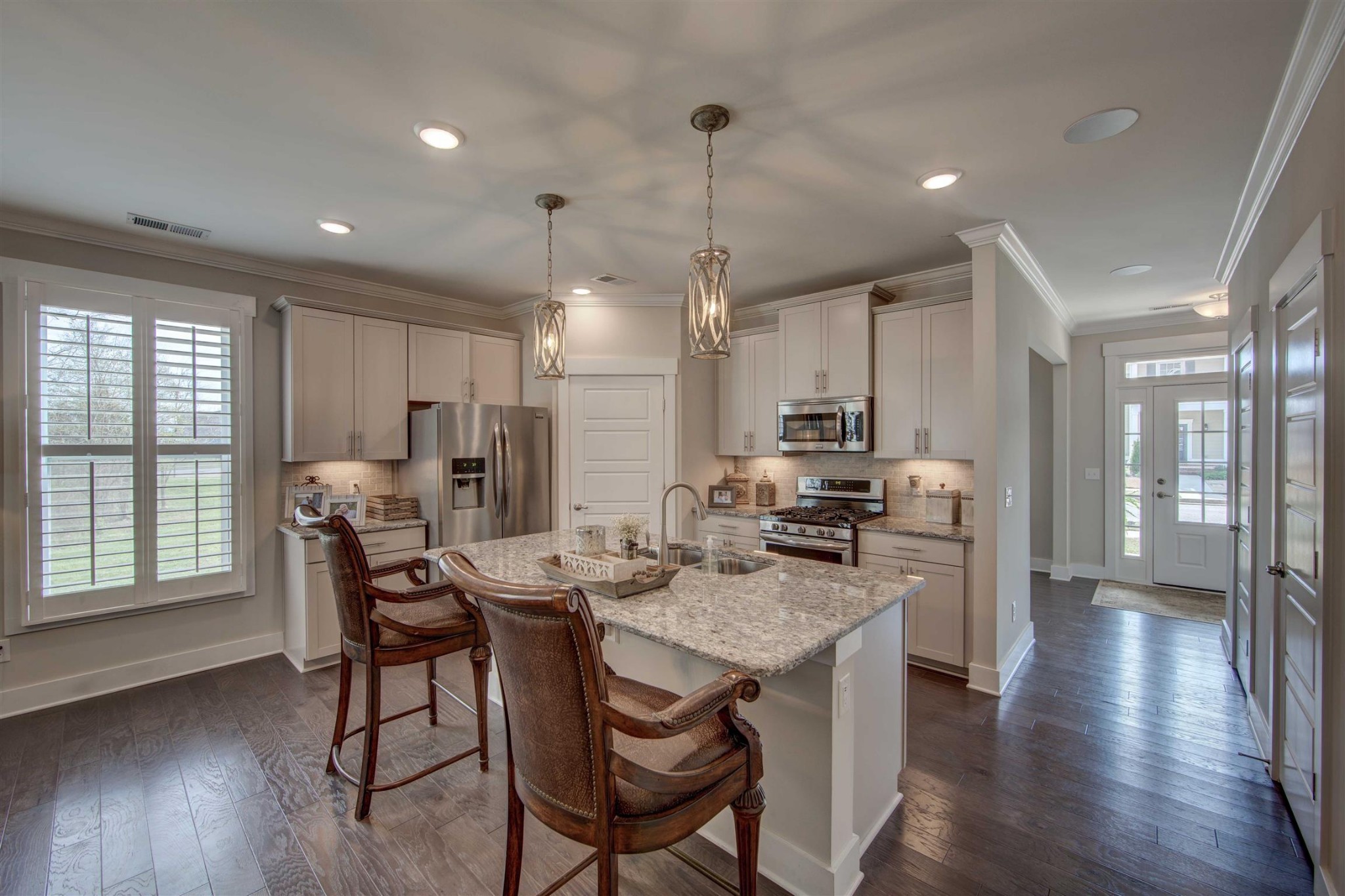 4343 Maxwell Road Antioch, TN 37013 - Photo 6 of 31 a kitchen with a table chairs refrigerator and microwave