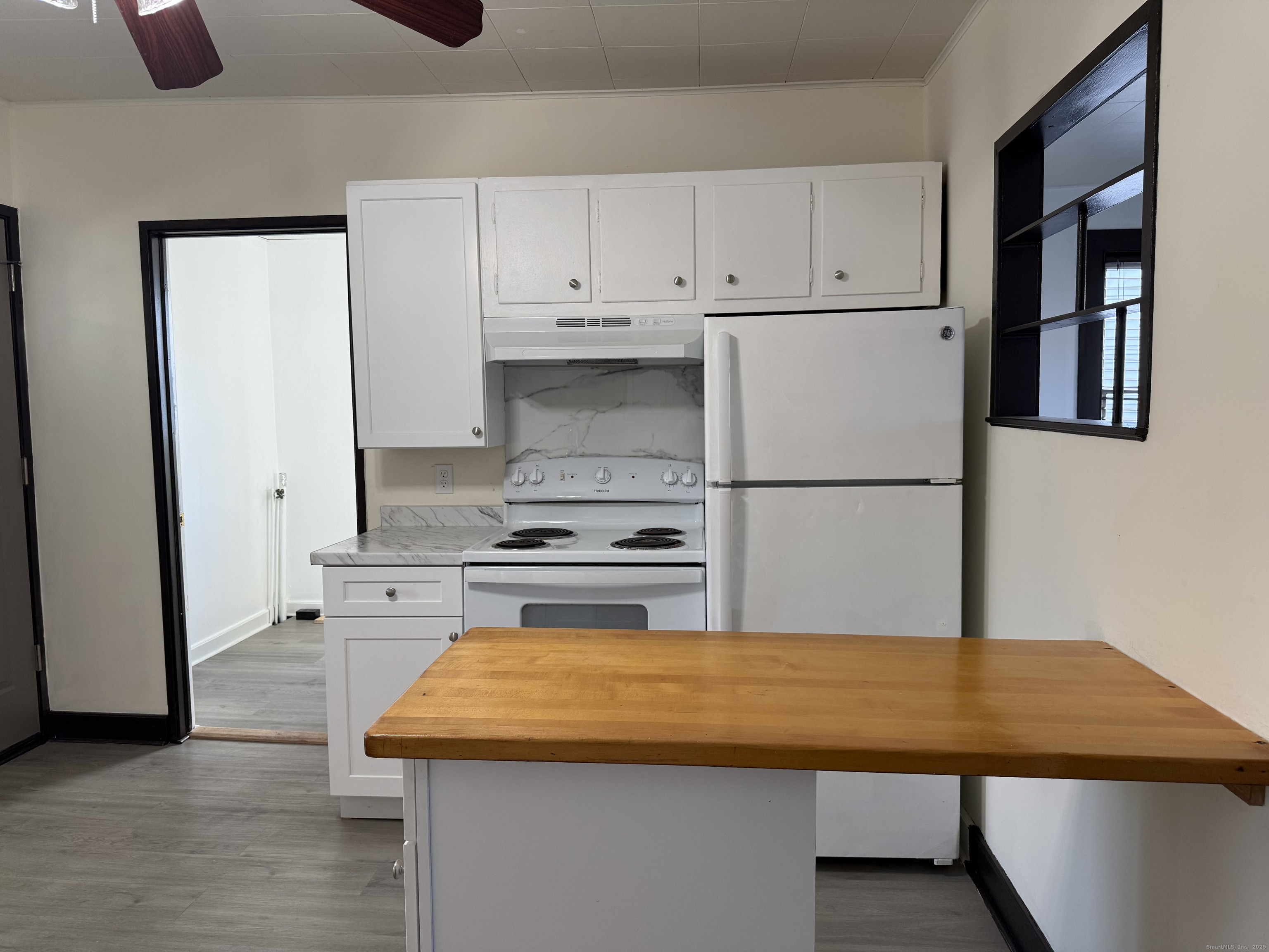 15 Freestone Avenue Portland, CT 06480 - Photo 3 of 13 a kitchen with stainless steel appliances a stove a refrigerator and a cabinets