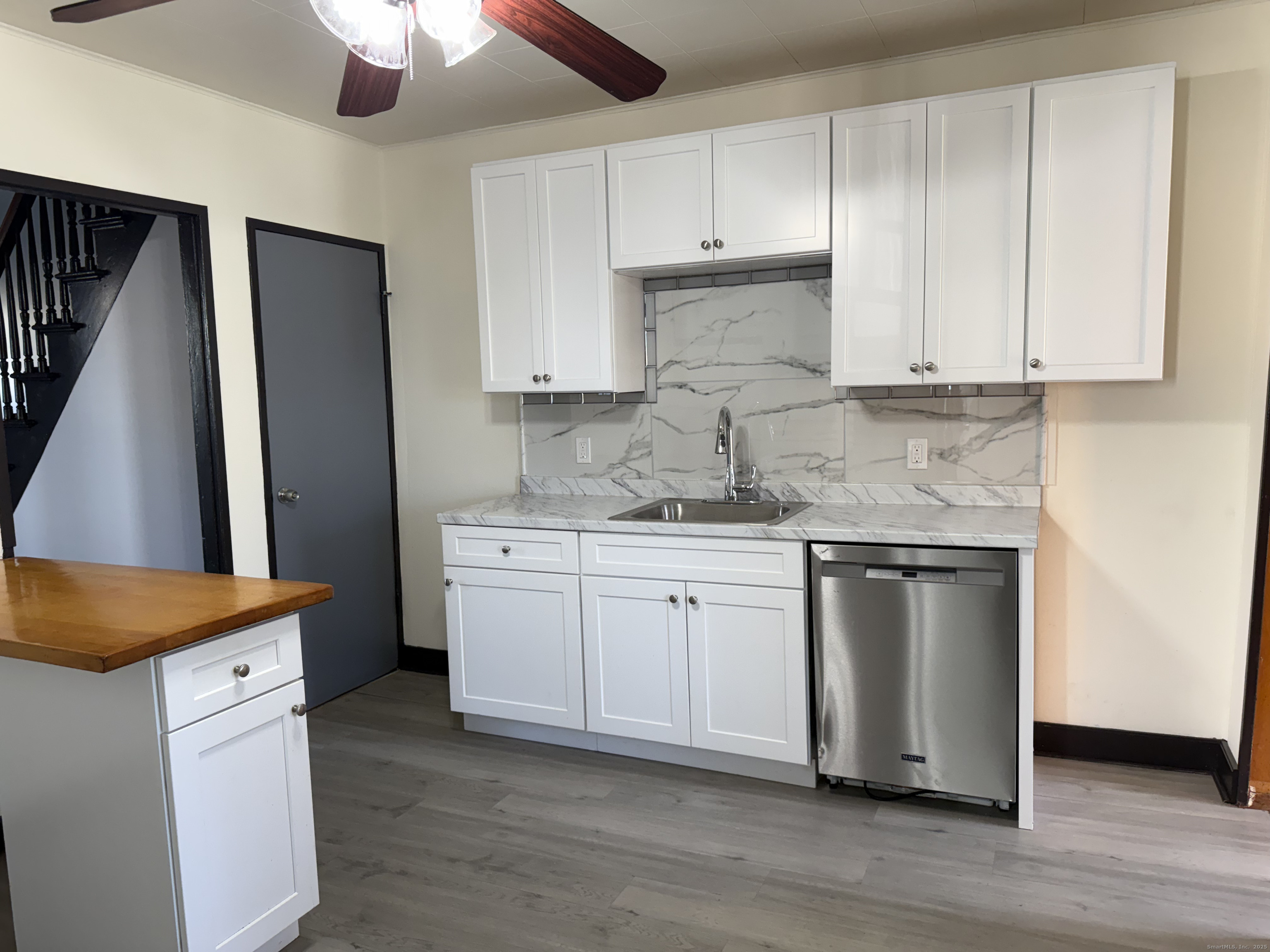15 Freestone Avenue Portland, CT 06480 - Photo 4 of 13 a kitchen with stainless steel appliances granite countertop a sink stove and refrigerator
