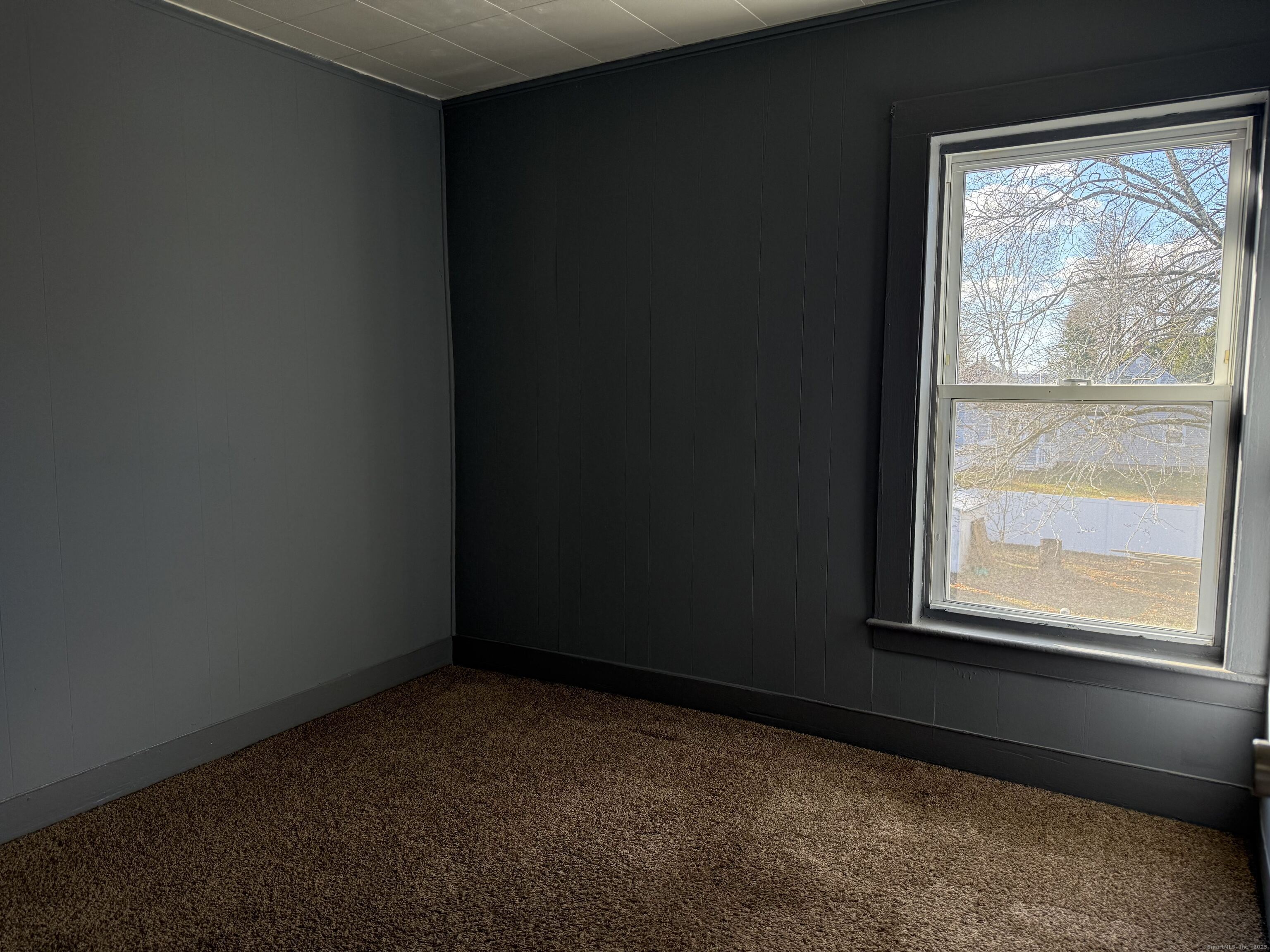 15 Freestone Avenue Portland, CT 06480 - Photo 10 of 13 a view of an empty room with a window