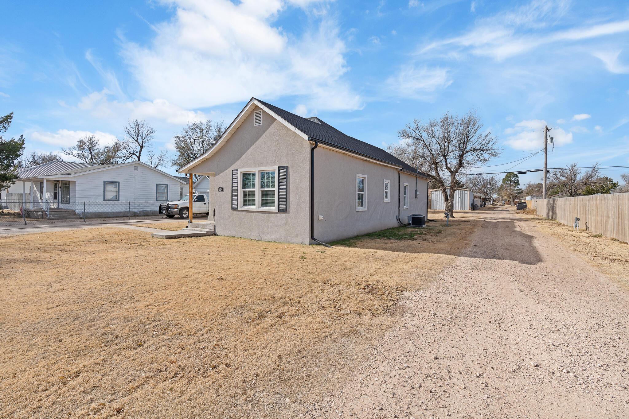 104 South Cherry Street Claude, TX 79019 - Photo 4 of 22 a view of a house with a snow yard
