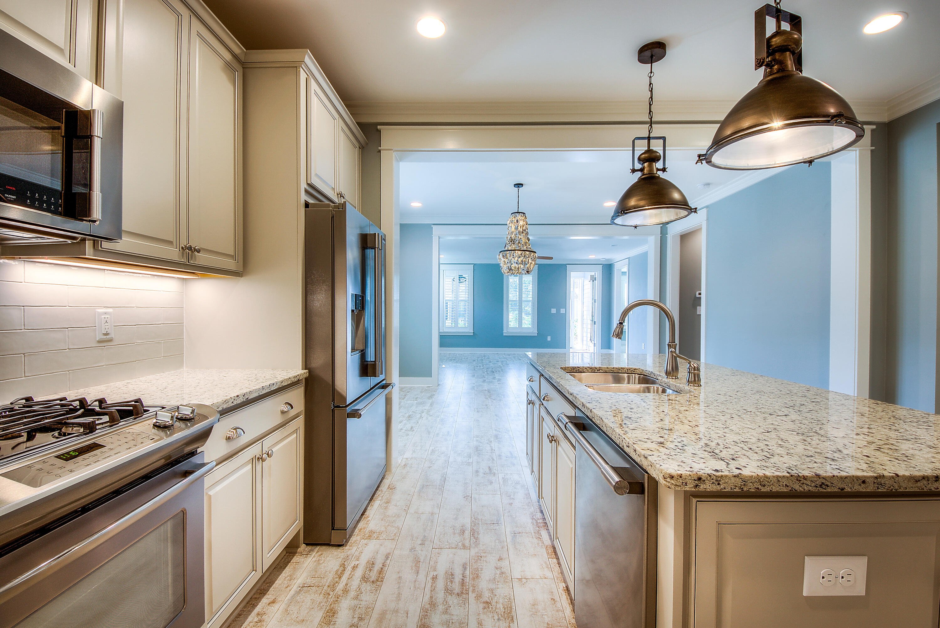 147 Jack Knife Drive Inlet Beach, FL 32461 - Photo 4 of 15 a kitchen with granite countertop a sink a stove and refrigerator