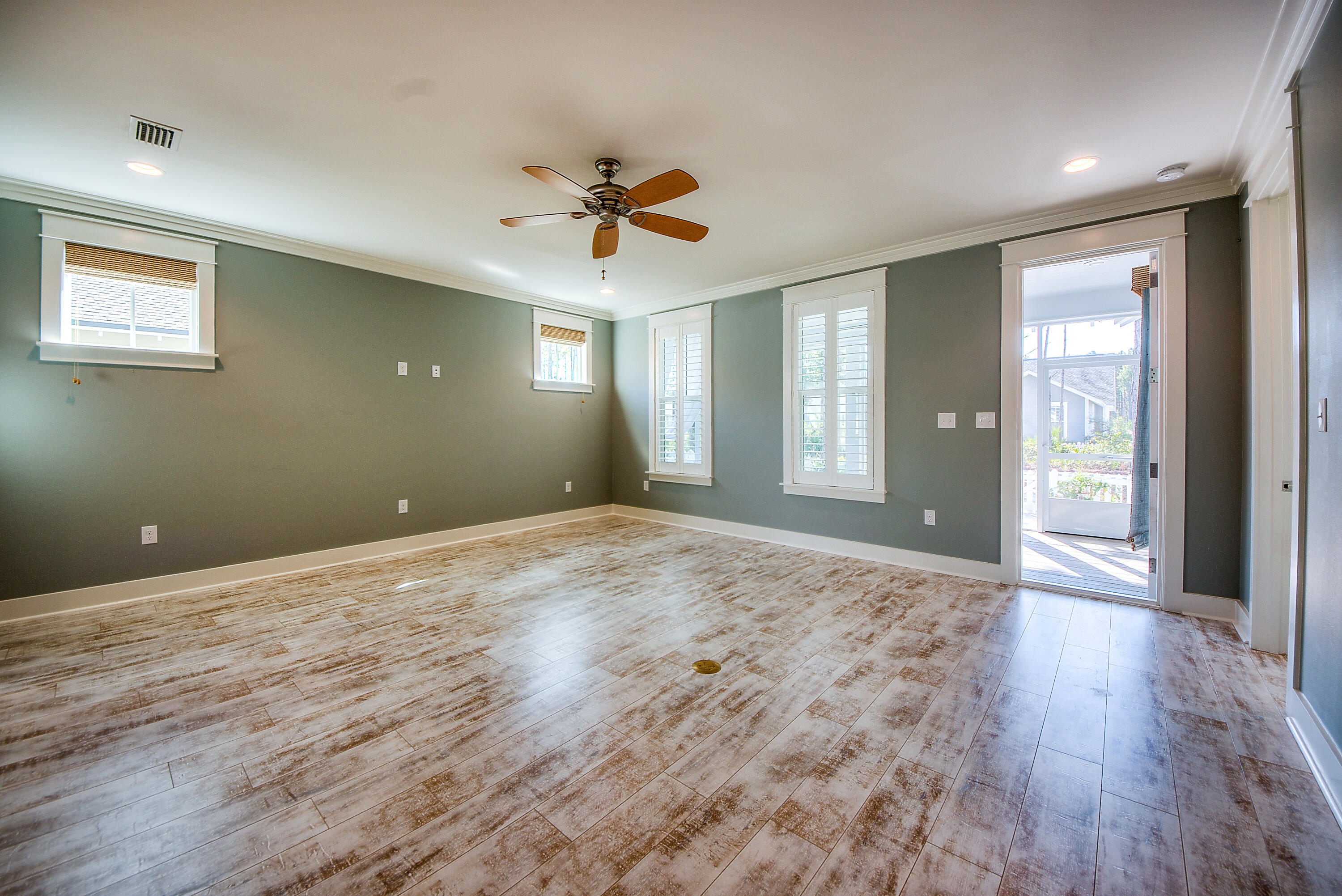 147 Jack Knife Drive Inlet Beach, FL 32461 - Photo 7 of 15 a view of empty room with wooden floor and fan