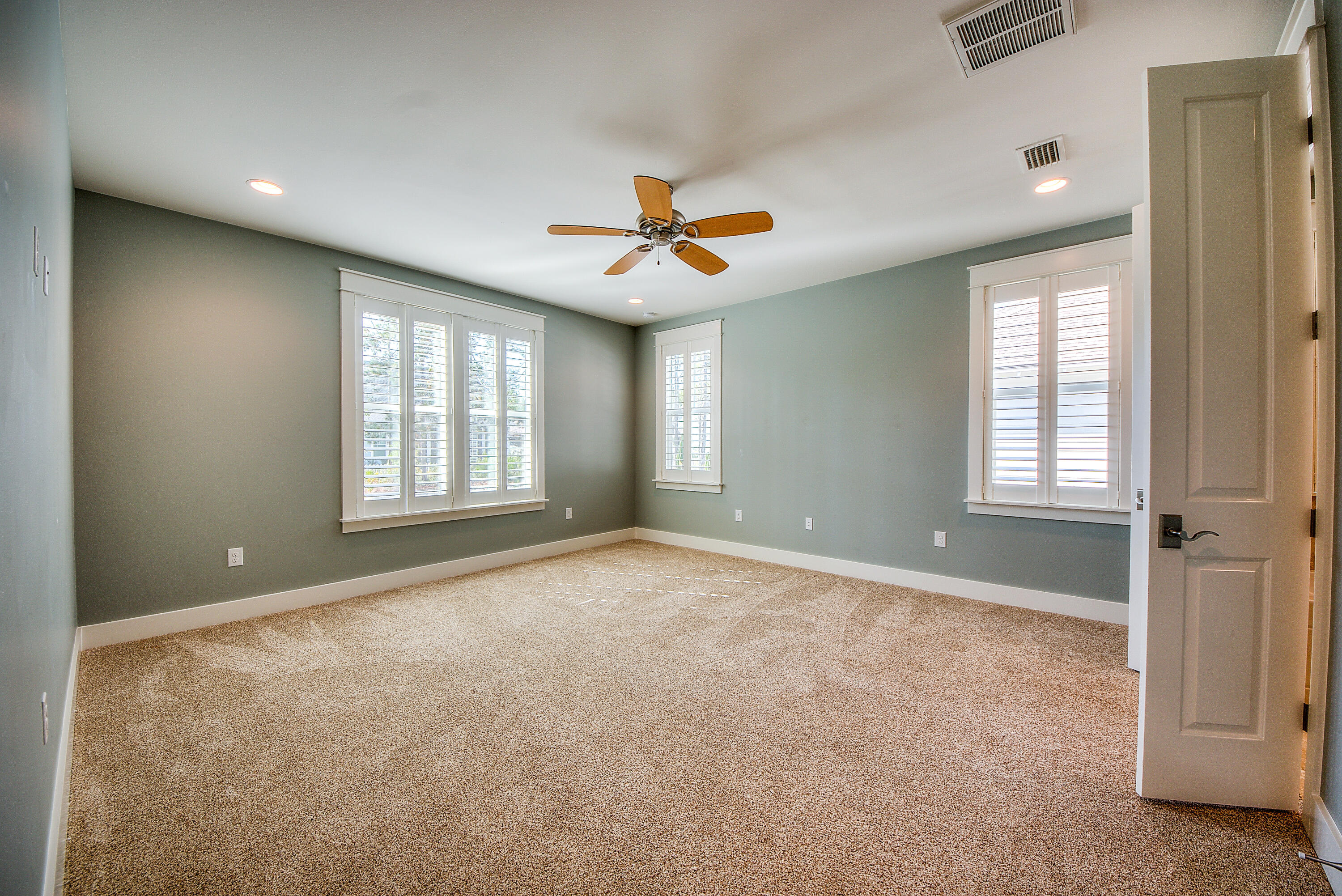 147 Jack Knife Drive Inlet Beach, FL 32461 - Photo 8 of 15 an empty room with windows and ceiling fan