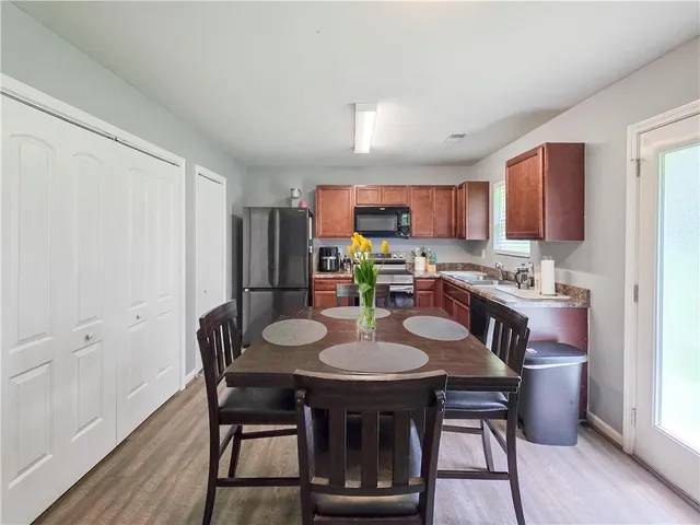 a view of a dining room with furniture