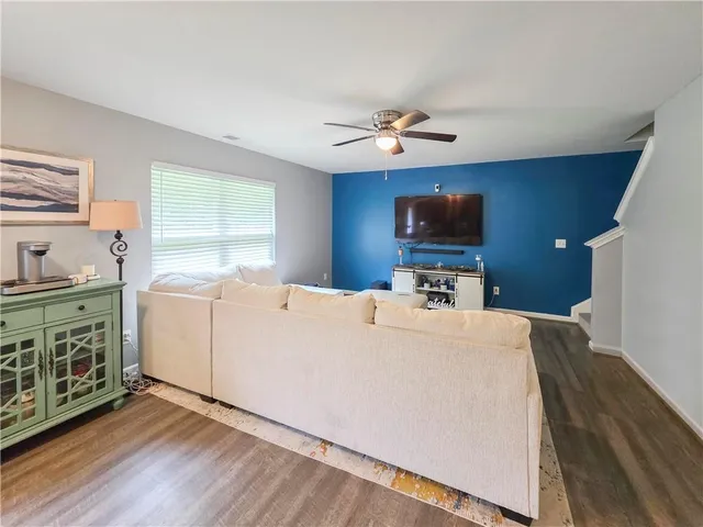 a view of kitchen with furniture and flat screen tv