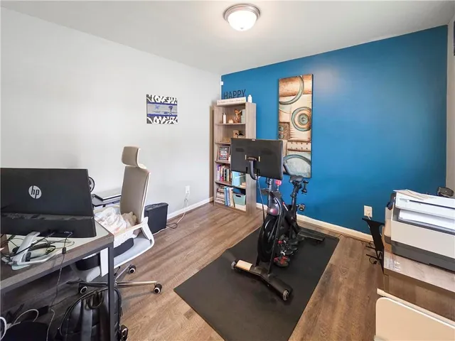 a view of workspace with gym equipment