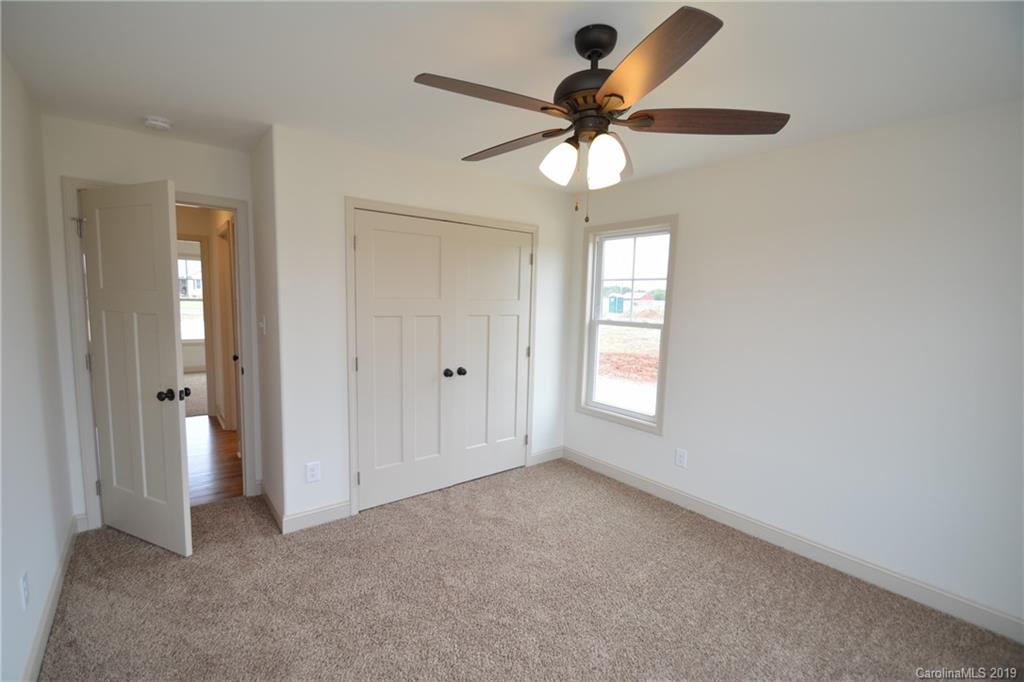 1331 George Brown Road Crouse, NC 28033 - Photo 17 of 39 wooden floor in an empty room and a window