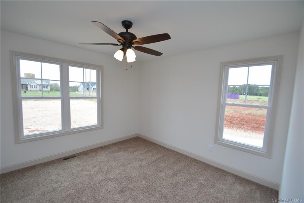 1331 George Brown Road Crouse, NC 28033 - Photo 21 of 39 a view of an empty room with a window