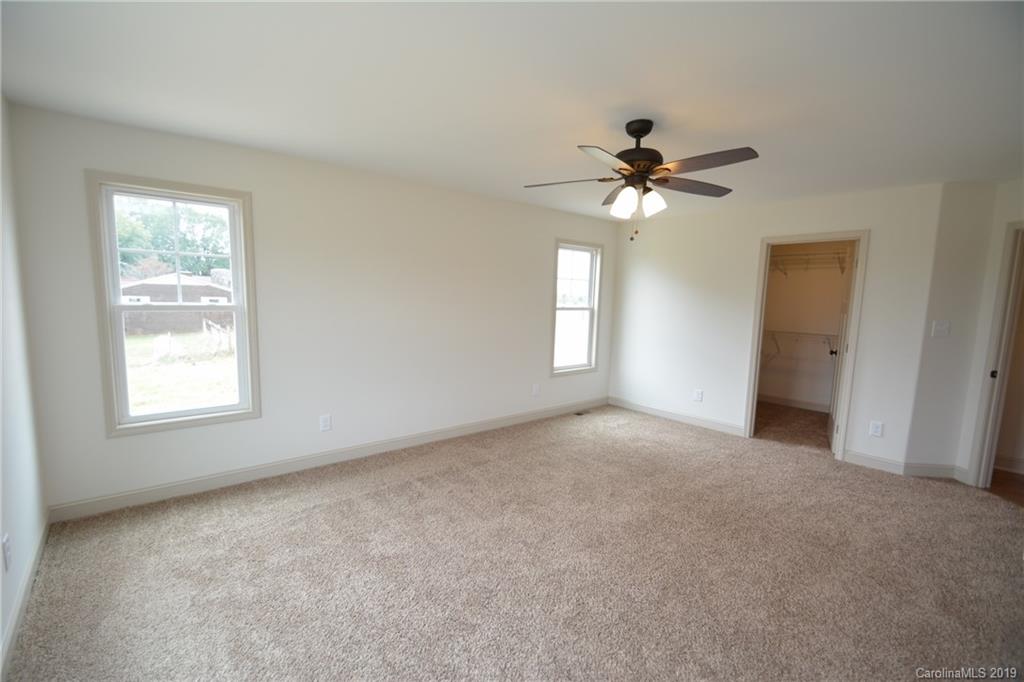 1331 George Brown Road Crouse, NC 28033 - Photo 25 of 39 a view of a room with a ceiling fan and windows