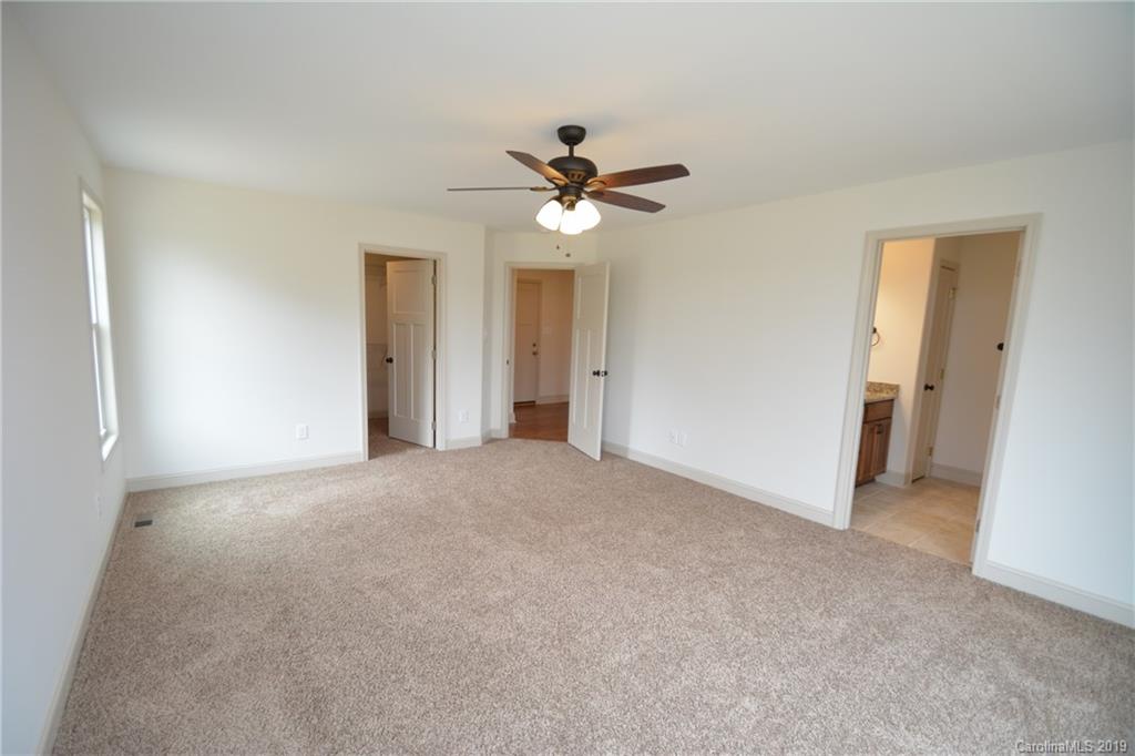 1331 George Brown Road Crouse, NC 28033 - Photo 32 of 39 a view of a room with a ceiling fan and a window