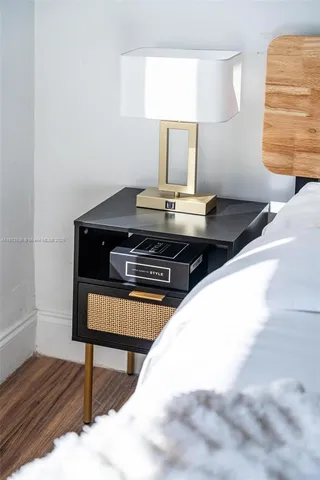 a living room with a sink and a table