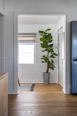 a view of entryway with wooden floor