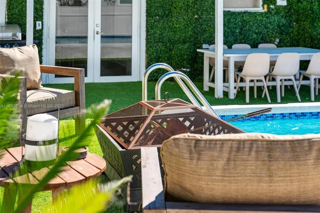 a view of a table and chairs in patio