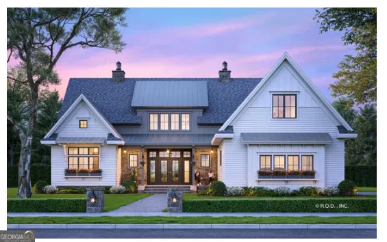 a front view of a house with a yard