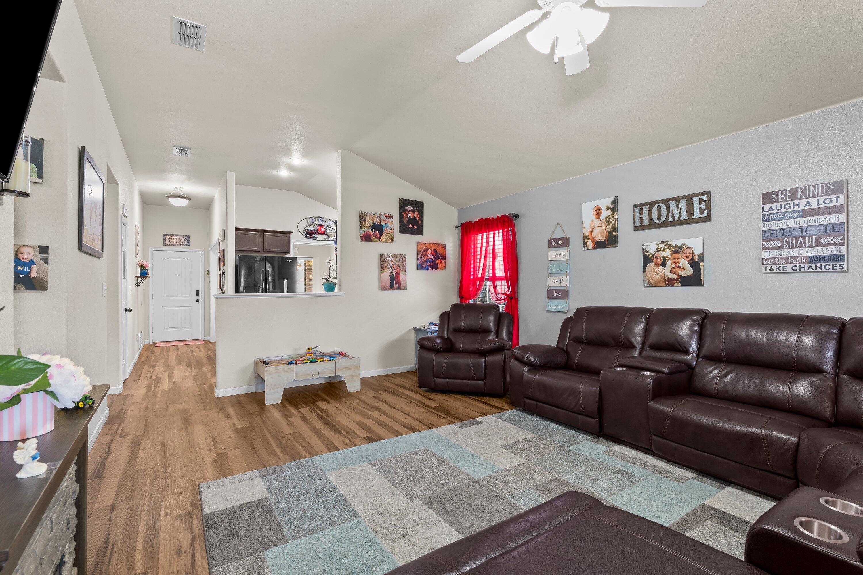 5607 108th Street Lubbock, TX 79424 - Photo 6 of 19 Living to kitchen