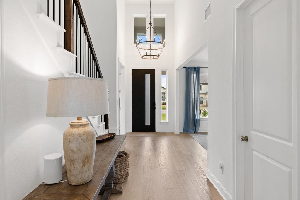 365 Pear Tree Lane Austin, TX 78737 - Photo 4 of 39 a view of hallway with furniture and a window