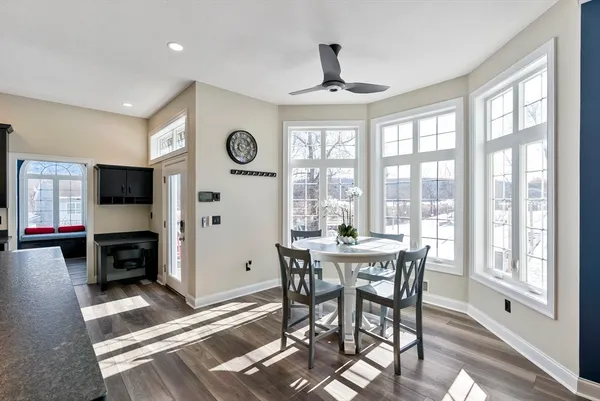 a view of a dining room with furniture window and outside view