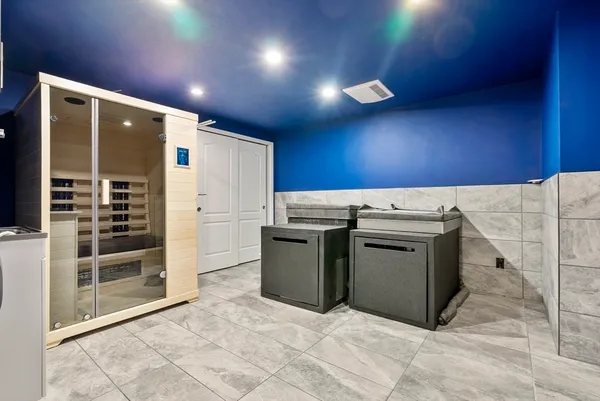 a utility room with dryer and washer