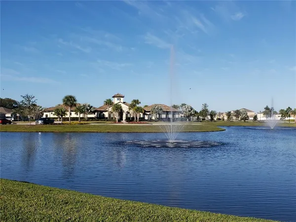 a view of a lake with a house