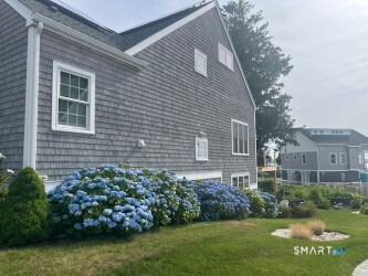27 Jerome Road New London, CT 06320 - Photo 3 of 39 Side of house where there are many Hydrangea's