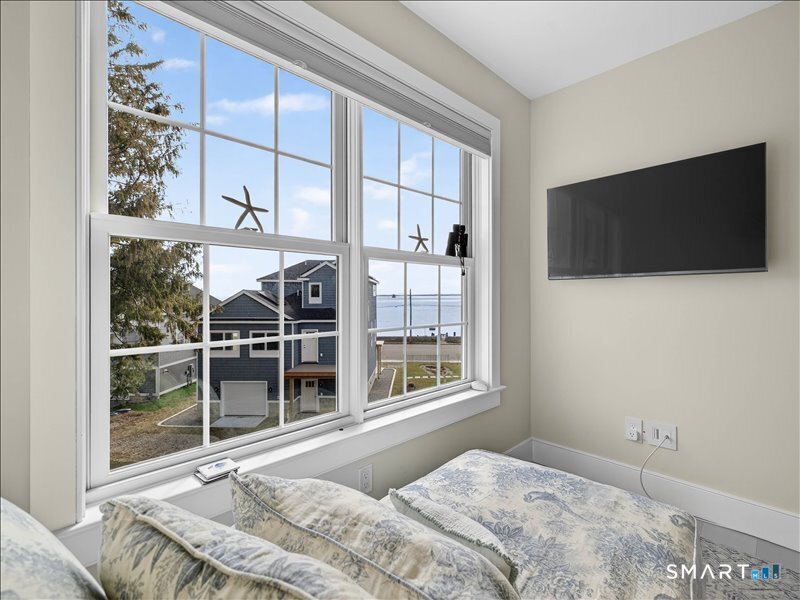 27 Jerome Road New London, CT 06320 - Photo 45 of 57 A view from the 3rd bedroom while the wife reads in the chaise lounge