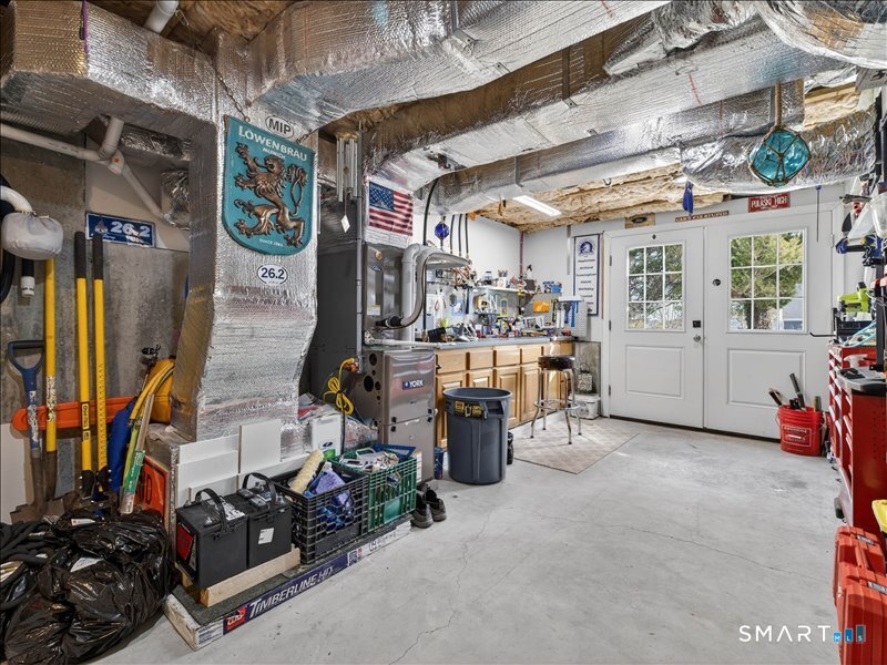 27 Jerome Road New London, CT 06320 - Photo 56 of 57 attached to the family room is the workshop