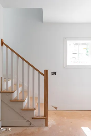 a black and white photo of a living room