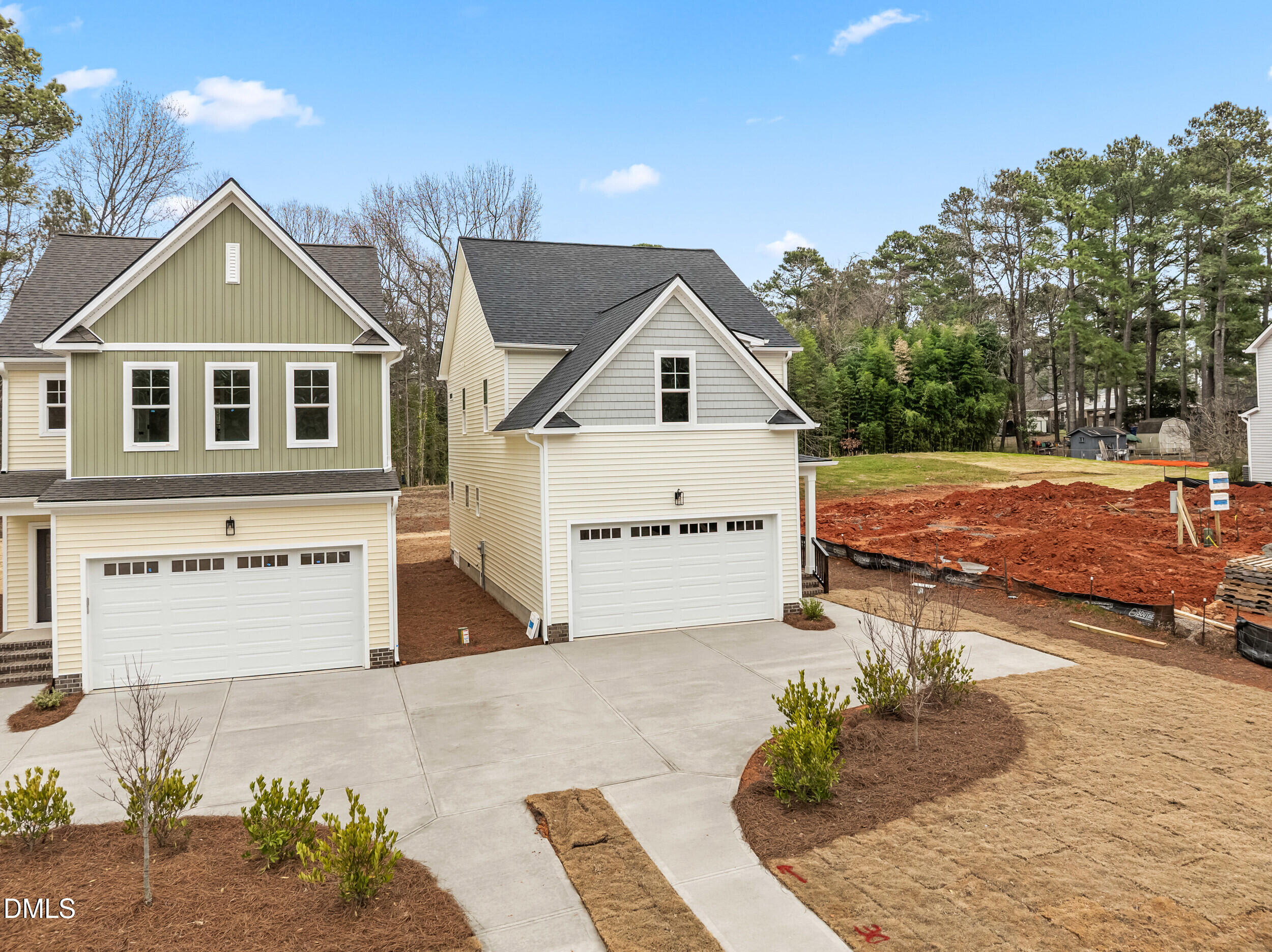 1020 Harper Road Raleigh, NC 27603 - Photo 3 of 52 a front view of a house with a yard