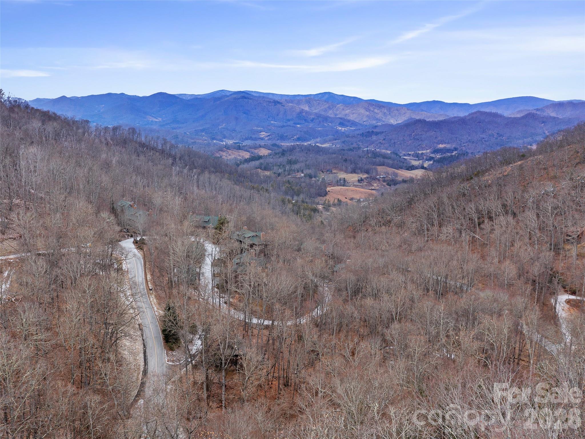 Lot 4 Heritage Ridge Road Burnsville, NC 28714 - Photo 13 of 28 a view of a house with a mountain