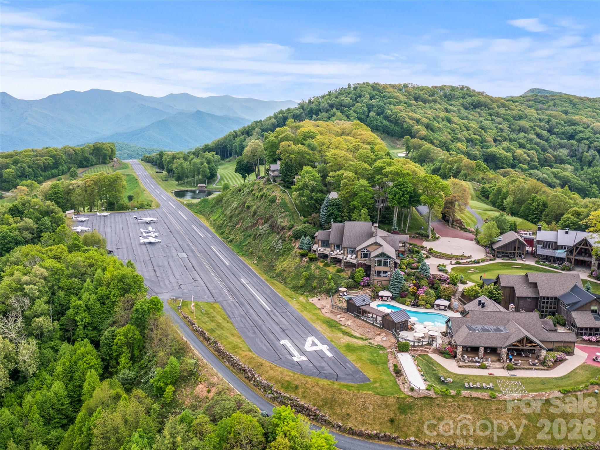 Lot 4 Heritage Ridge Road Burnsville, NC 28714 - Photo 23 of 28 a view of a lake with a mountain in the background