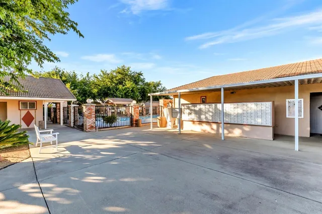 a view of a house with a street