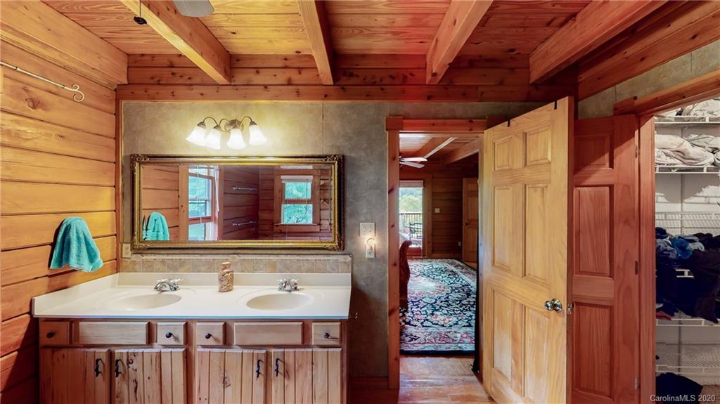 1823 Barnard Road Marshall, NC 28753 - Photo 11 of 48 a bathroom with a sink and a mirror