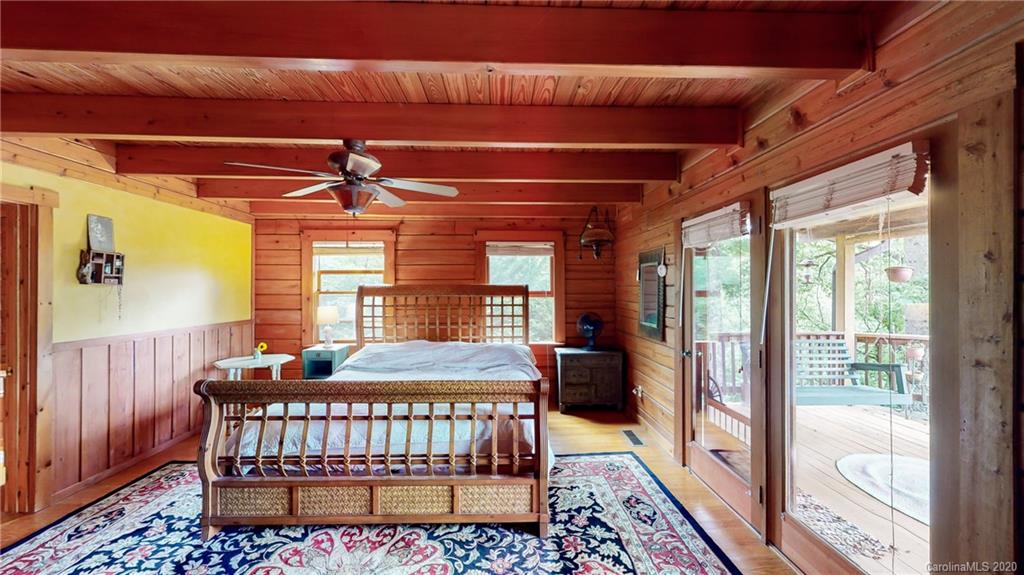 1823 Barnard Road Marshall, NC 28753 - Photo 12 of 48 a bedroom with furniture and a window