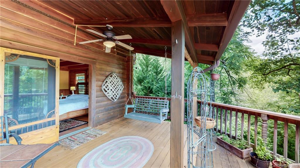 1823 Barnard Road Marshall, NC 28753 - Photo 14 of 48 a view of balcony with wooden floor