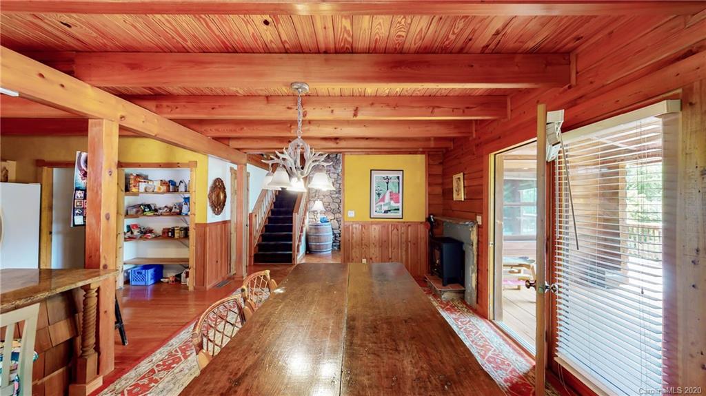 1823 Barnard Road Marshall, NC 28753 - Photo 20 of 48 a view of a hallway with wooden floor and staircase