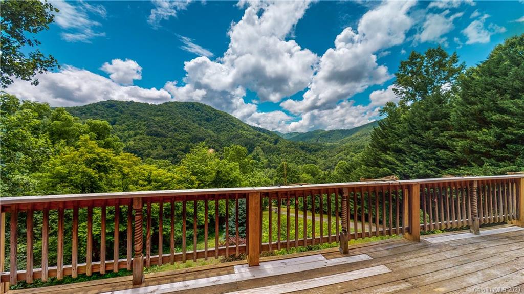 1823 Barnard Road Marshall, NC 28753 - Photo 3 of 48 a view of a balcony with wooden floor