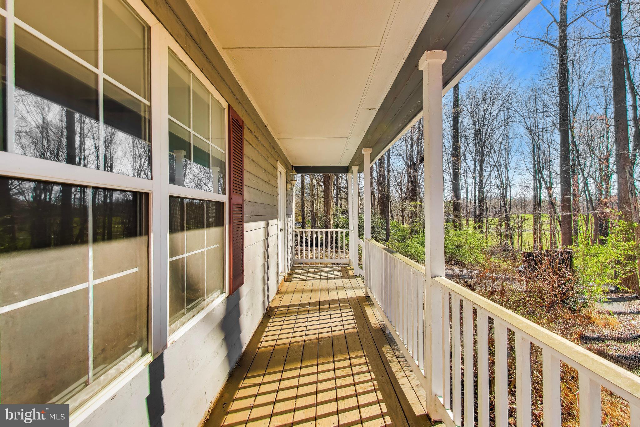 525 Stoakley Road Prince Frederick, MD 20678 - Photo 4 of 41 Charming porch with serene views.