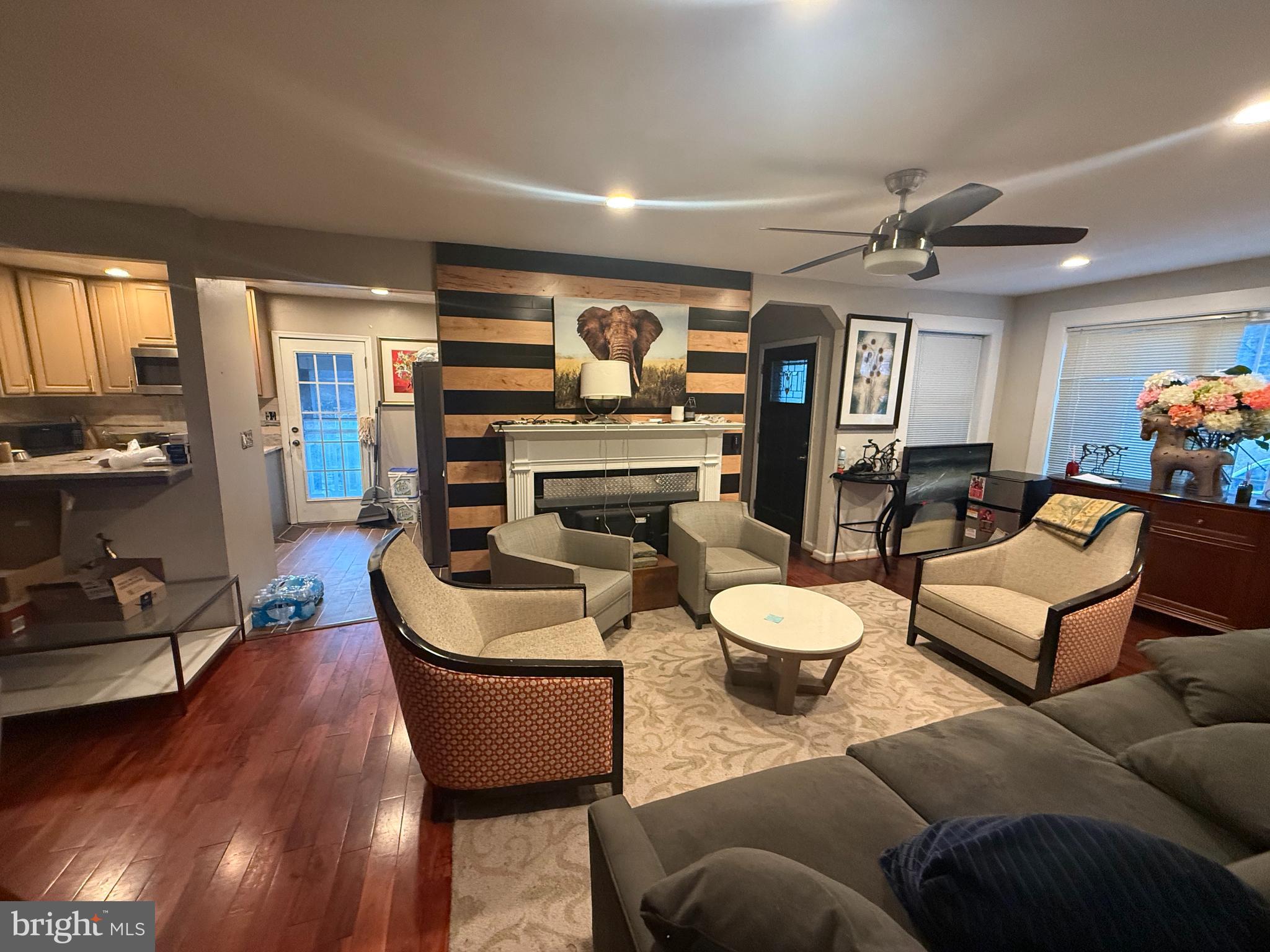 5603 Hawthorne Street Cheverly, MD 20785 - Photo 16 of 88 a living room with furniture and a wooden floor