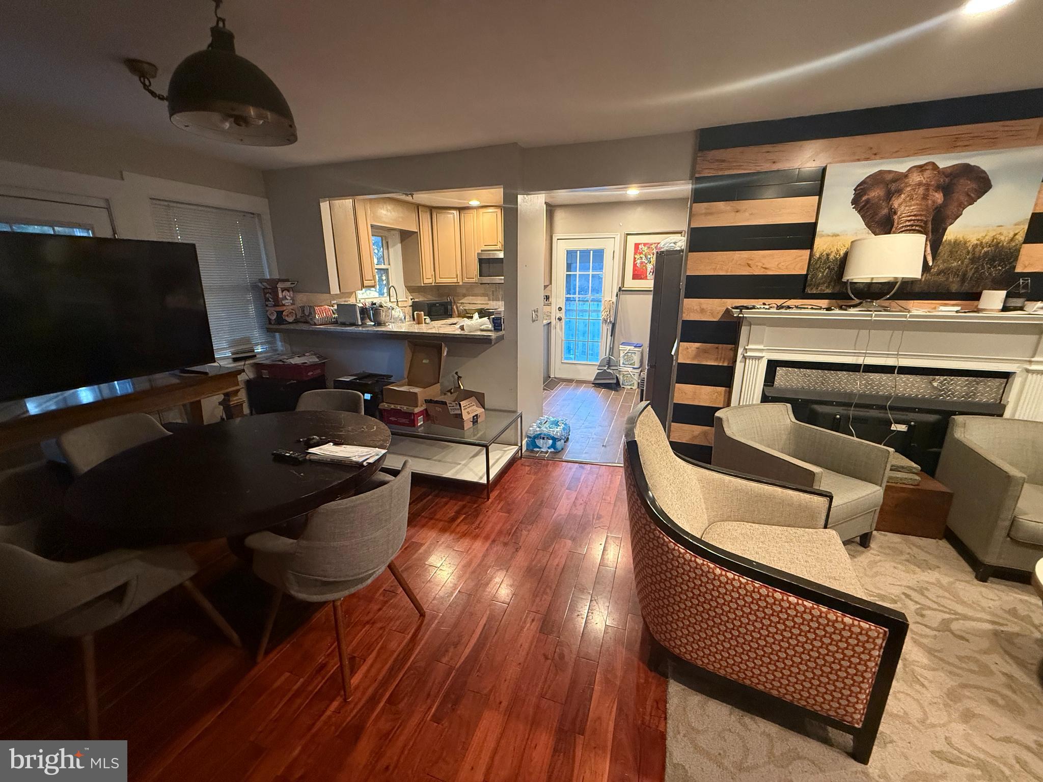 5603 Hawthorne Street Cheverly, MD 20785 - Photo 17 of 88 a living room with furniture and a flat screen tv