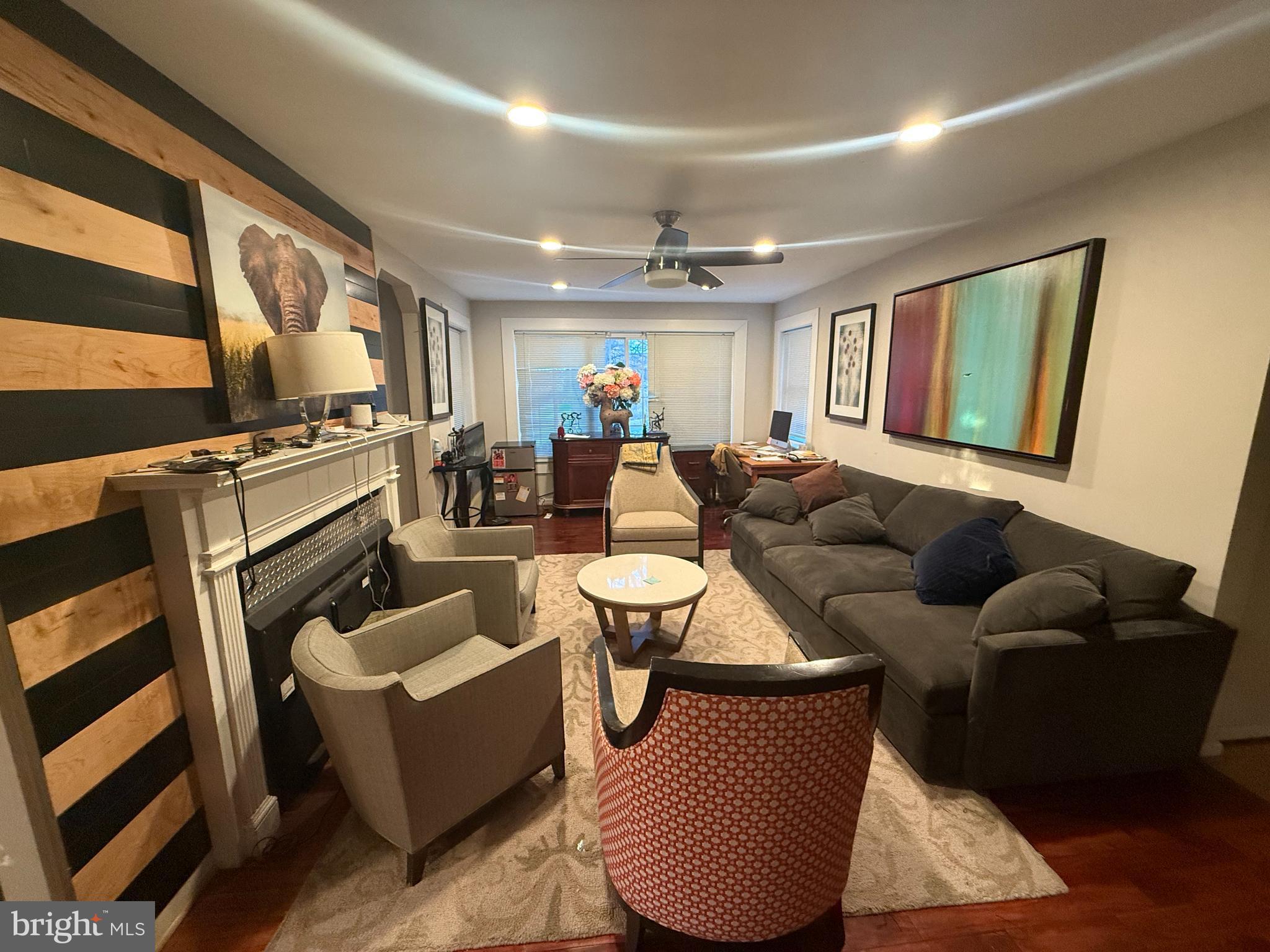 5603 Hawthorne Street Cheverly, MD 20785 - Photo 18 of 88 a living room with furniture and a rug