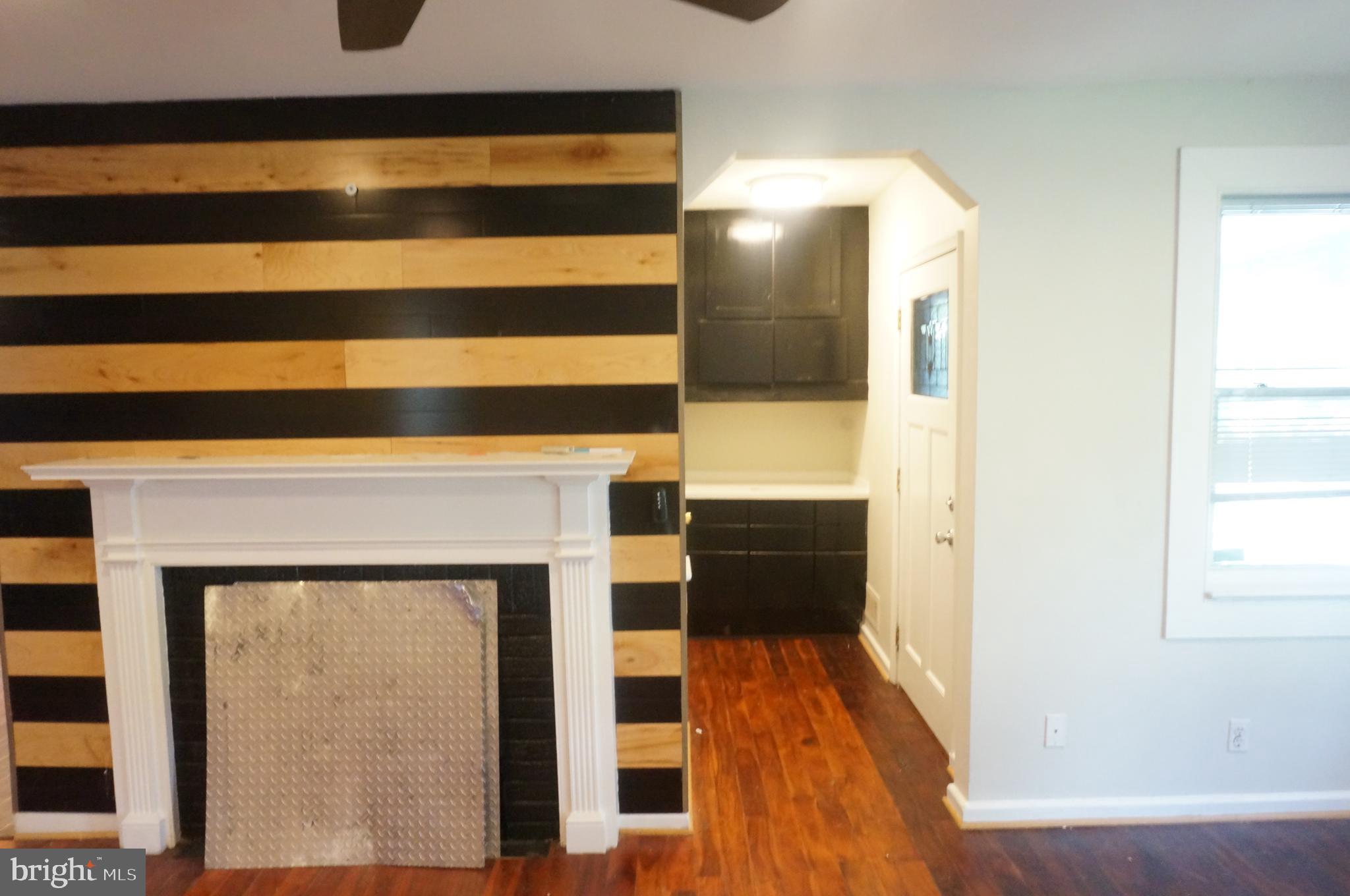 5603 Hawthorne Street Cheverly, MD 20785 - Photo 22 of 88 a view of a living room with a wooden floor