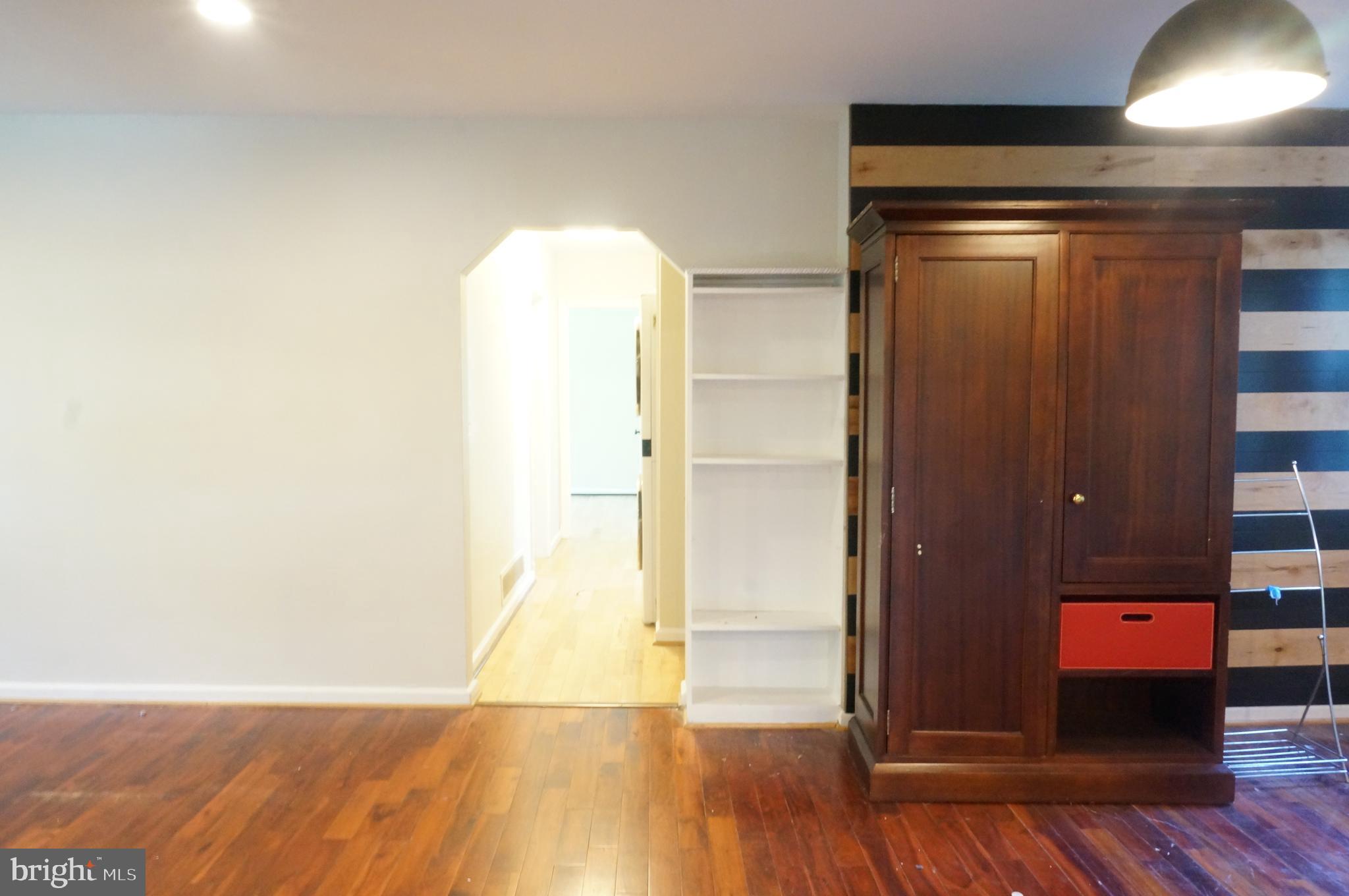 5603 Hawthorne Street Cheverly, MD 20785 - Photo 29 of 88 an empty room with wooden floor and closet