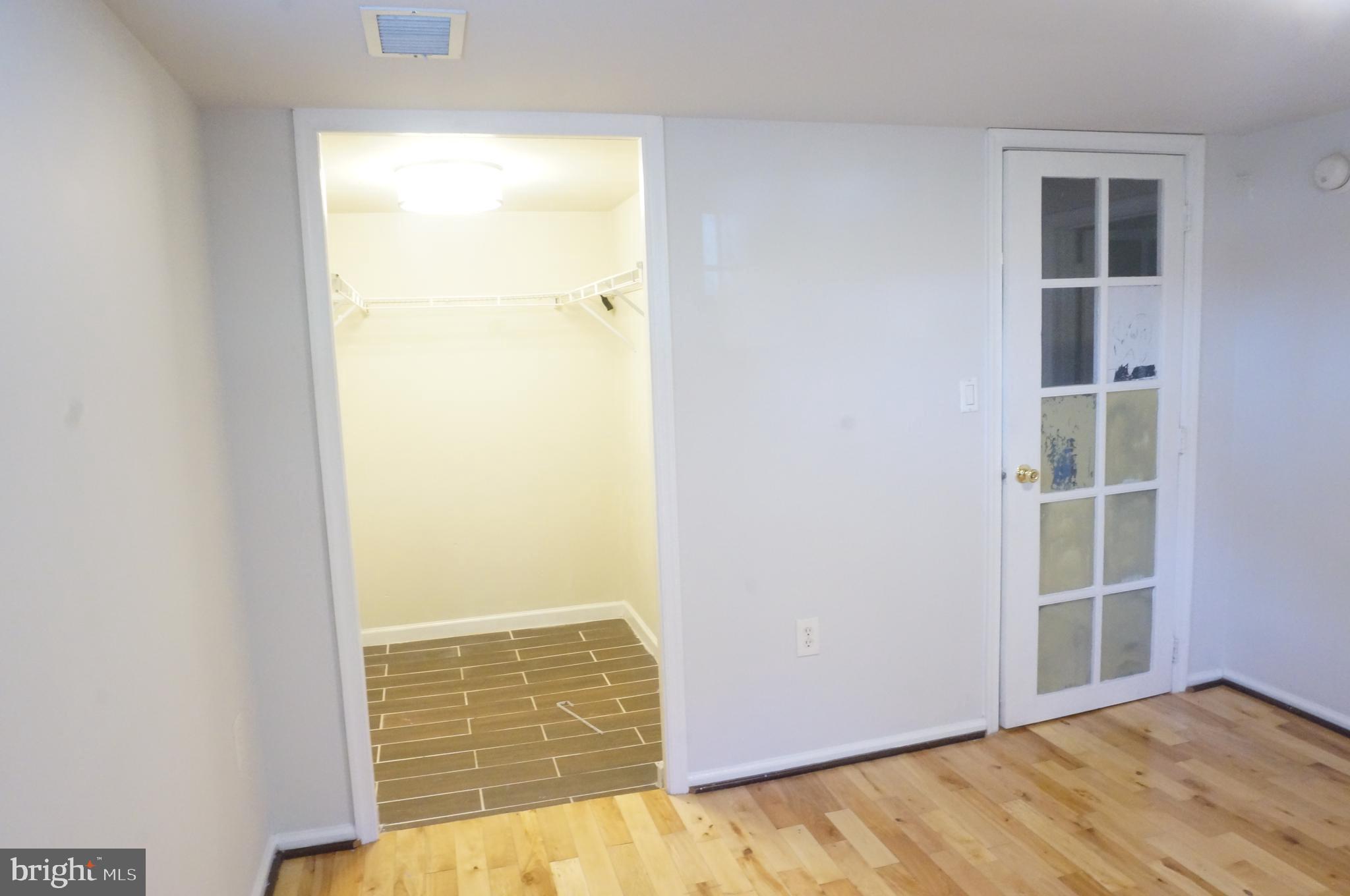 5603 Hawthorne Street Cheverly, MD 20785 - Photo 55 of 88 an empty room with windows