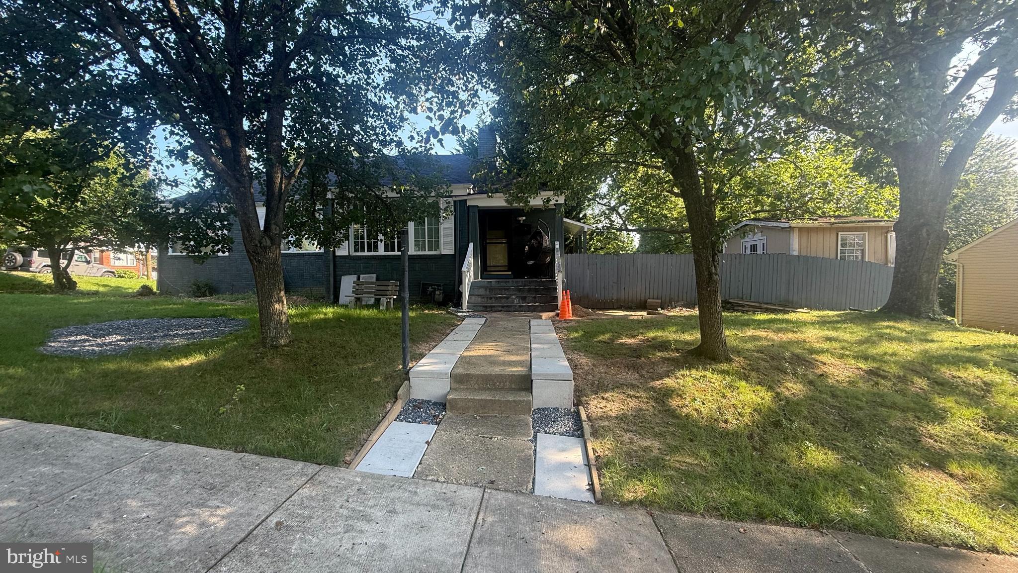 5603 Hawthorne Street Cheverly, MD 20785 - Photo 8 of 88 a front view of a house with a yard and an trees